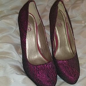Pink black pumps